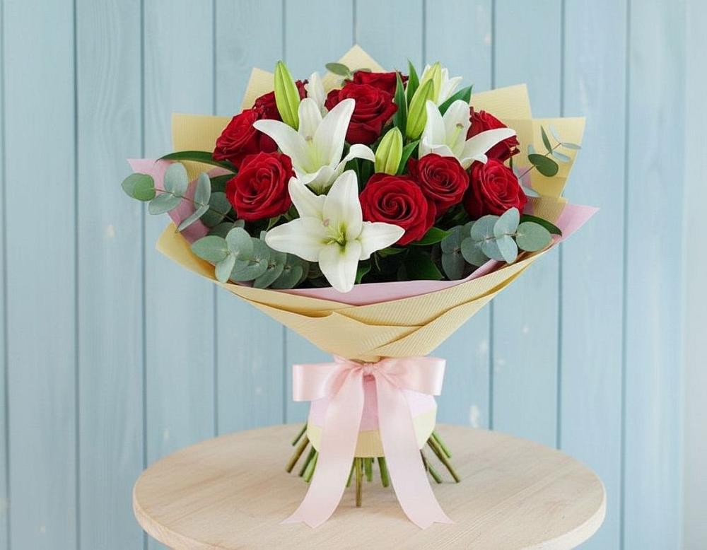 Букет цветов из: Лилии и Розы в Венцах